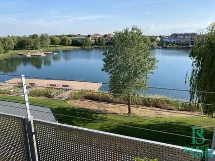 Urlaub zu Hause am See – wunderschöne 3-Zimmer-Dachgeschosswohnung mit 100m² Sonnenterrasse und Tiefgaragenplatz!