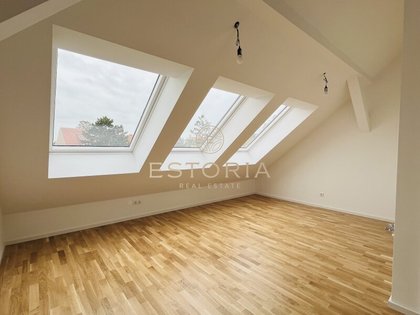 Dachgeschosswohnung mit kleiner hofseitigen Terrasse zum Bestpreis in 1220 Wien - Eigengrund!