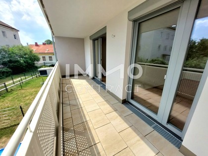 Neubauwohnung / Garagenplatz  / Loggia  mit Blick ins Grüne