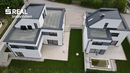 Neubau - Wohnung mit großer Terrasse und Garten