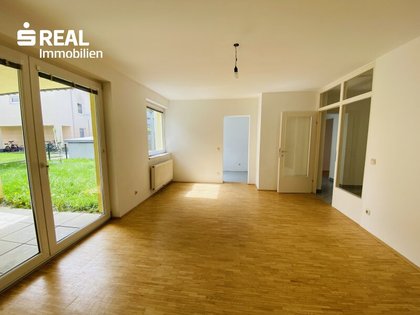 Traumhaftes Wohnen am Wallersee - EG-Wohnung mit Garten, Terrasse und Garage in Top-Lage für nur € 334.000,00!